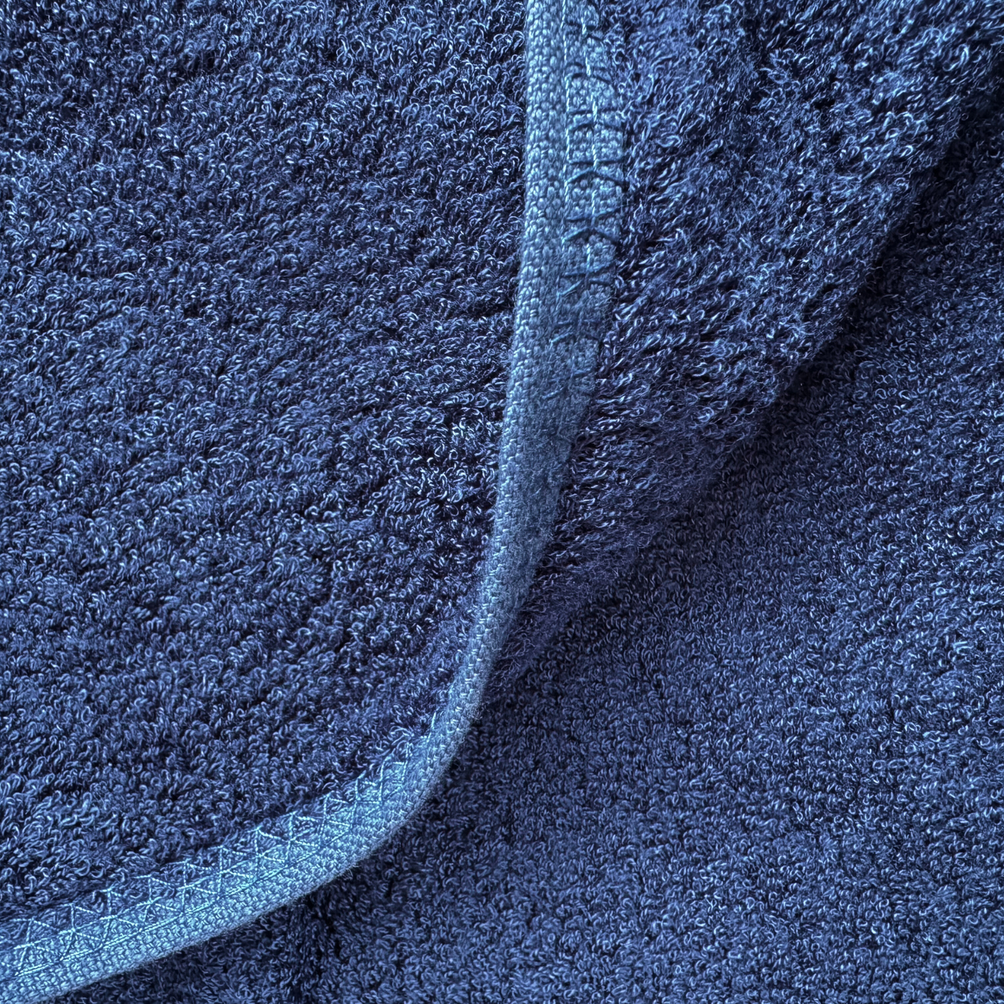 Close-up of blue bamboo towel texture – soft, absorbent and sustainable