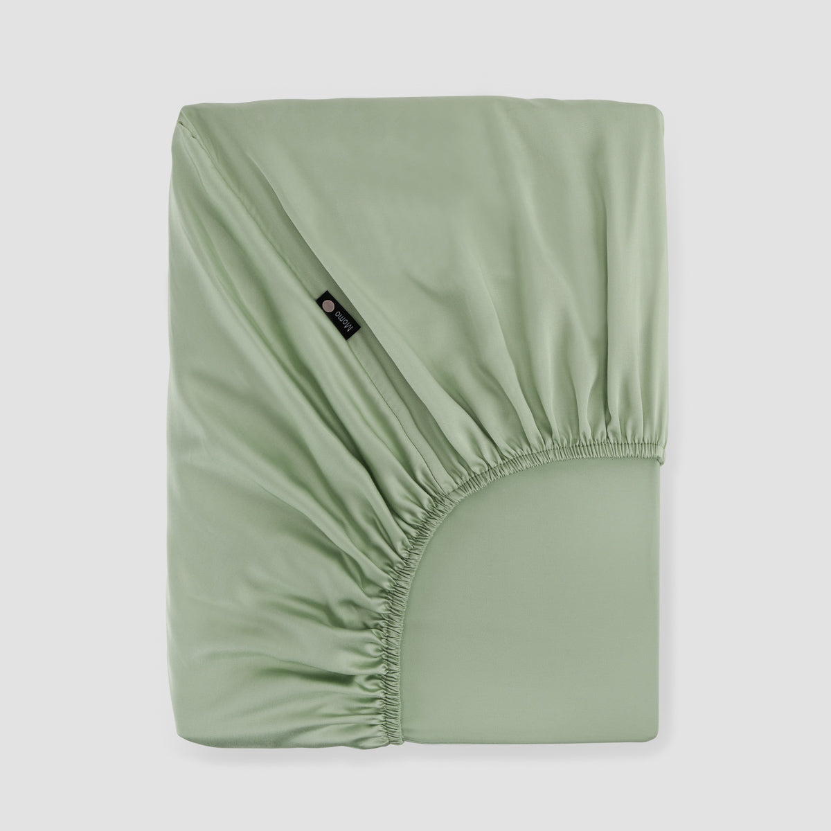 Lençol de baixo ajustável verde bambu by Momo Cotton – tecido de cetim 300 fios, suave, respirável e sustentável.