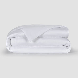 Copripiumino bianco bambù by Momo Cotton – raso 300 fili, morbido, traspirante e sostenibile.