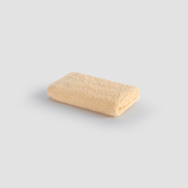 Asciugamano viso beige in bambù Momo Cotton – morbido, assorbente, asciugatura veloce e sostenibile